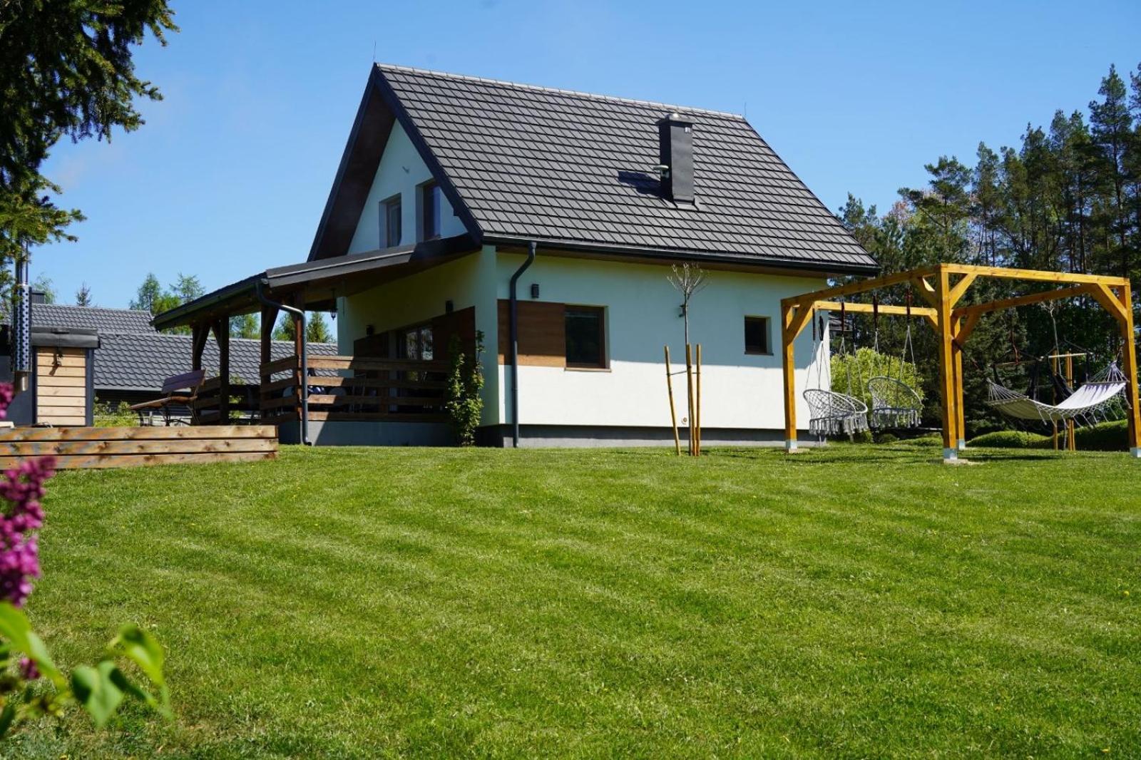 Domek Z Kominkiem Nad Jeziorem Z Jacuzzi Ogrodowym Sumowo  Esterno foto